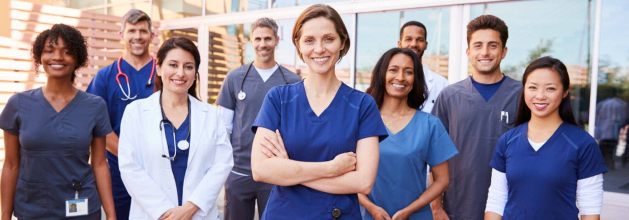Group of healthcare professionals smiling at camera