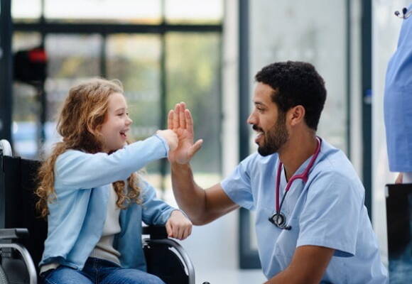 Patient High Five Male Nurse